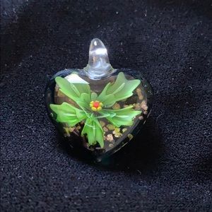 Hand blown glass pendent with flower heart shaped